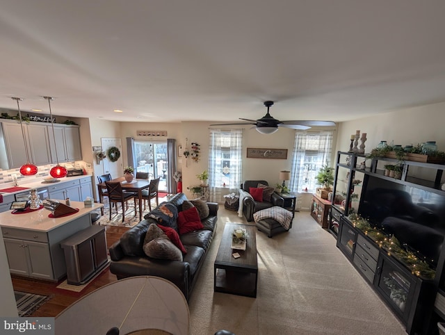 living room featuring ceiling fan