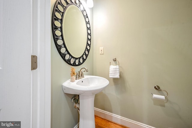 bathroom featuring wood-type flooring