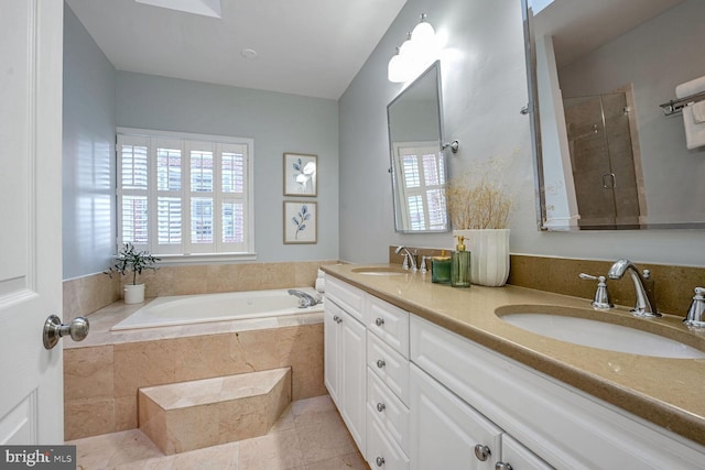 bathroom with shower with separate bathtub, vanity, and tile patterned floors