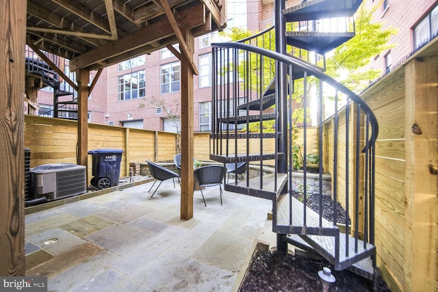 view of patio featuring central AC unit