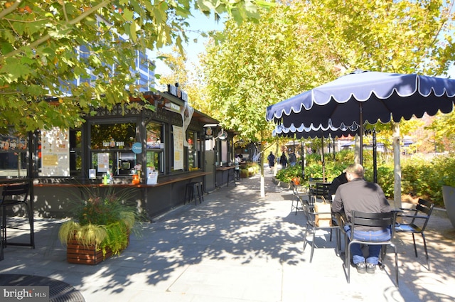 view of property's community with a patio area