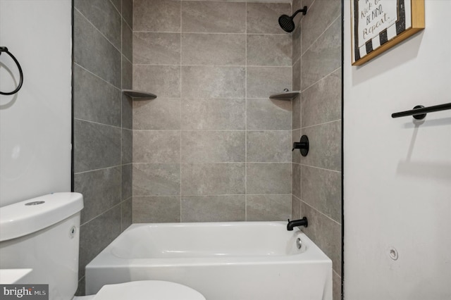 bathroom featuring toilet and tub / shower combination