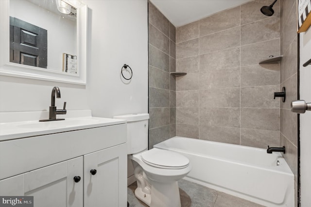 full bathroom featuring tile patterned flooring, vanity, toilet, and tiled shower / bath combo