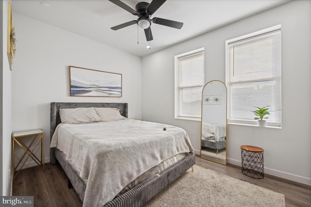 bedroom featuring ceiling fan and wood-type flooring