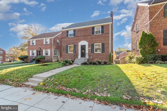 view of front of house with a front yard