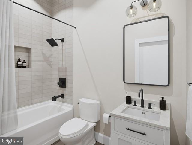 full bathroom featuring vanity, toilet, and shower / tub combo