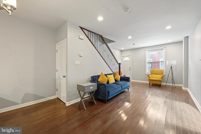 sitting room featuring dark hardwood / wood-style flooring