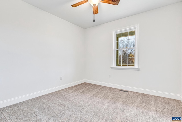 unfurnished room featuring carpet flooring and ceiling fan