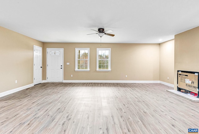 unfurnished living room with light hardwood / wood-style floors and ceiling fan