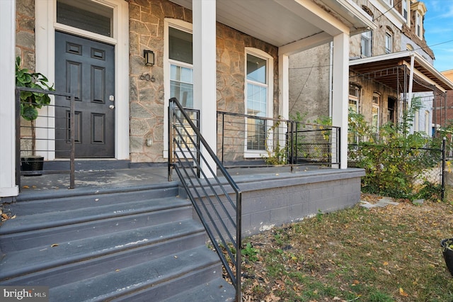 entrance to property with covered porch