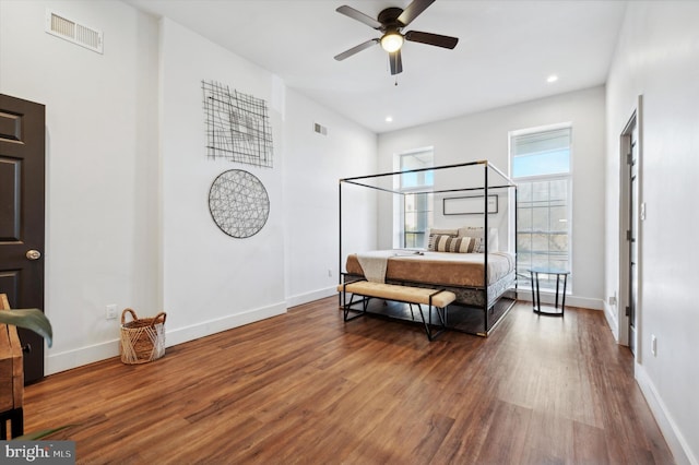 bedroom featuring dark hardwood / wood-style flooring