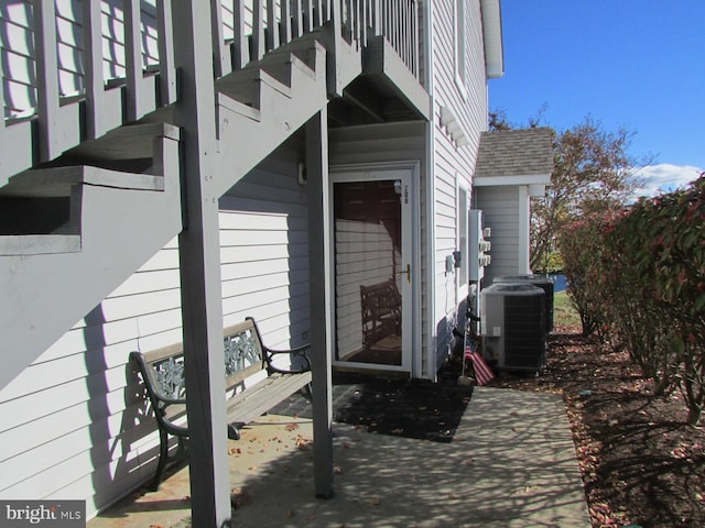 exterior space featuring central AC unit and a patio area