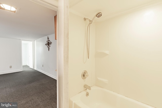 bathroom with shower / washtub combination