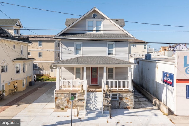 view of front of property featuring covered porch