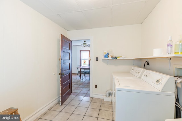 laundry area with separate washer and dryer, ceiling fan, and light tile patterned floors