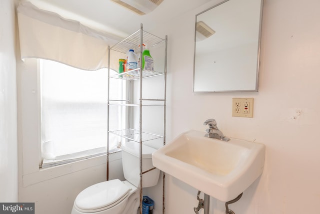 bathroom featuring sink and toilet