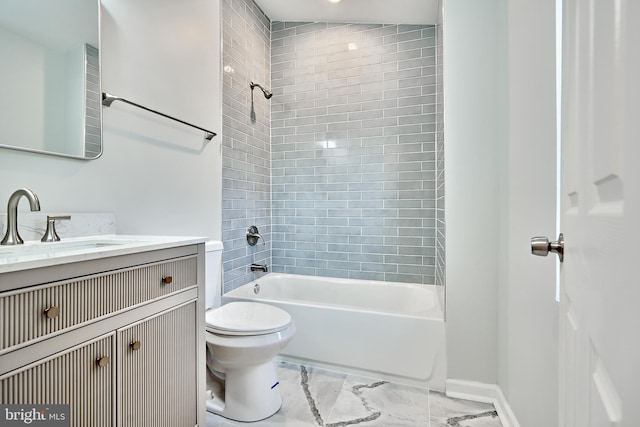 1341 Sargeant St, Baltimore, MD 21223 - full bathroom featuring toilet, washtub / shower combination, vanity, marble finish flooring, and baseboards