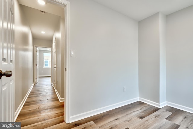 corridor featuring light wood-type flooring