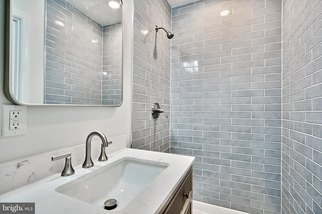 1341 Sargeant St, Baltimore, MD 21223 - full bathroom featuring vanity and a tile shower