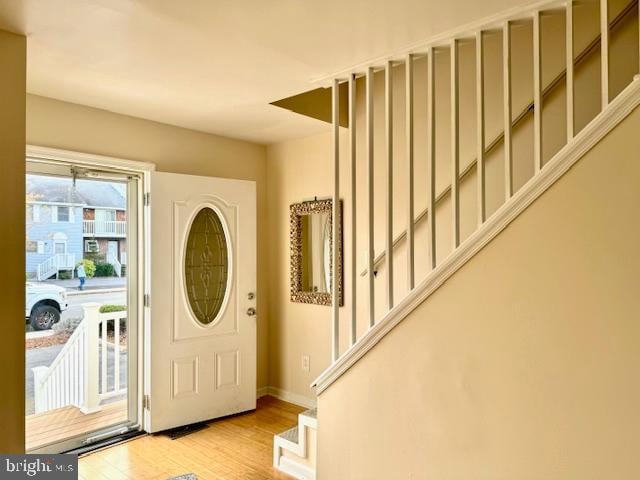 foyer with light hardwood / wood-style floors