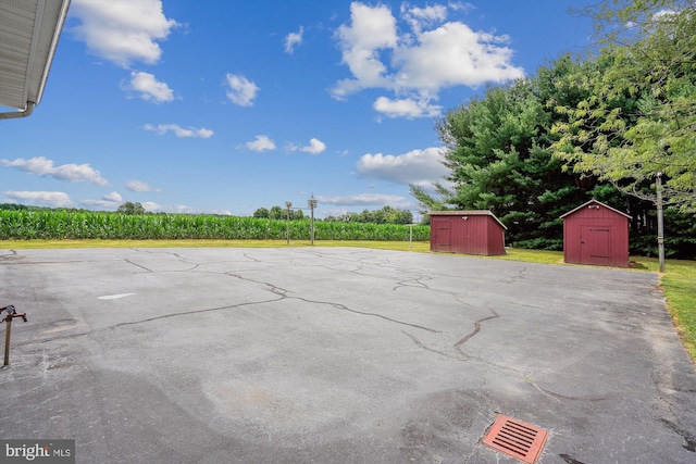 view of patio / terrace featuring a storage unit