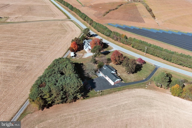 birds eye view of property featuring a rural view