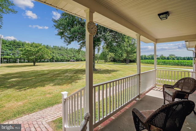 view of patio featuring a porch