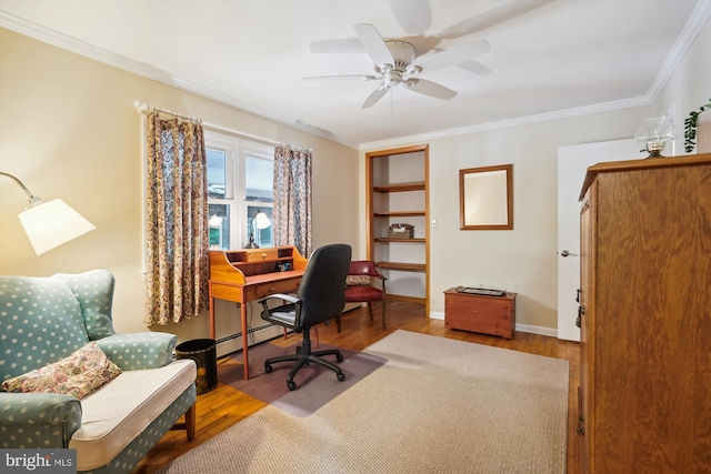 office featuring ornamental molding, wood-type flooring, baseboard heating, and ceiling fan