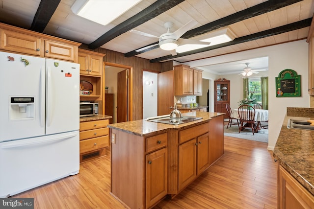 kitchen featuring electric cooktop, white fridge with ice dispenser, beamed ceiling, ceiling fan, and light hardwood / wood-style flooring