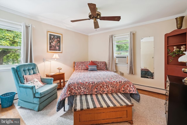 bedroom with cooling unit, ornamental molding, light hardwood / wood-style floors, baseboard heating, and ceiling fan