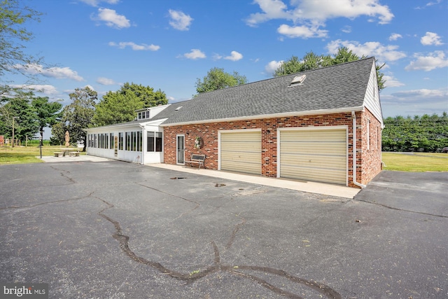 view of front of home with a garage