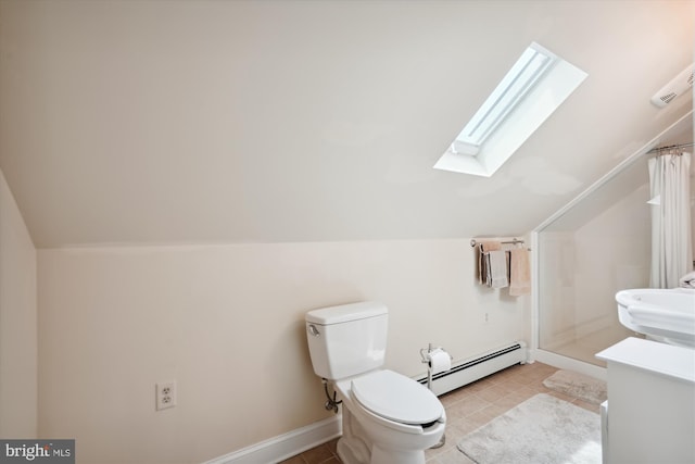 bathroom featuring sink, lofted ceiling with skylight, a shower with shower curtain, a baseboard heating unit, and toilet