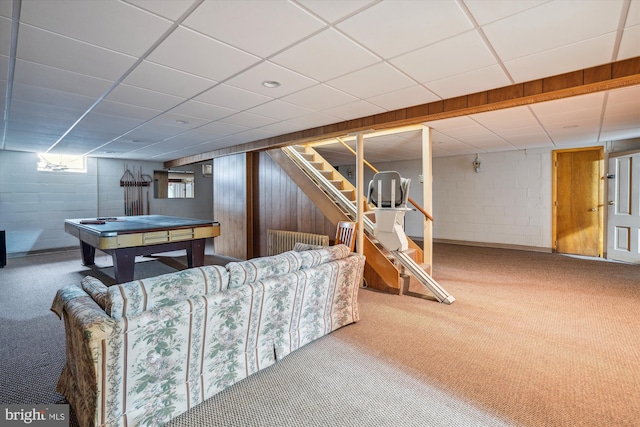 playroom with radiator heating unit, pool table, carpet floors, and a drop ceiling