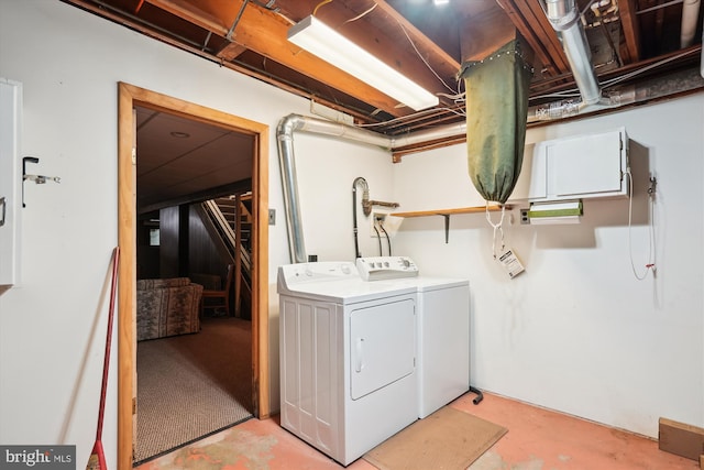 washroom featuring washer and dryer