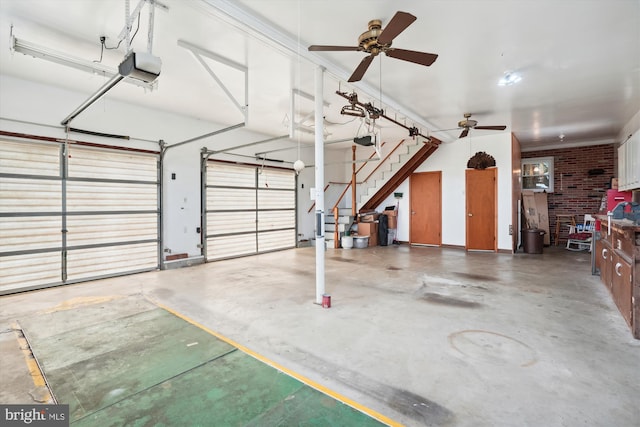 garage featuring ceiling fan and a garage door opener