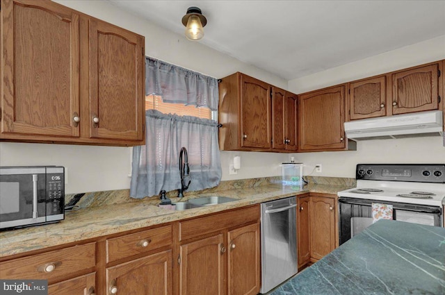 kitchen featuring stainless steel appliances and sink