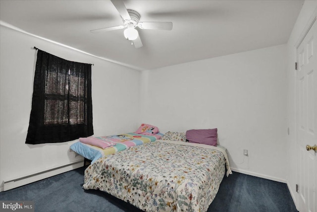 carpeted bedroom featuring ceiling fan and a baseboard heating unit