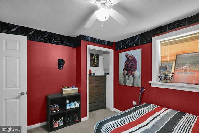 bedroom with light colored carpet and ceiling fan