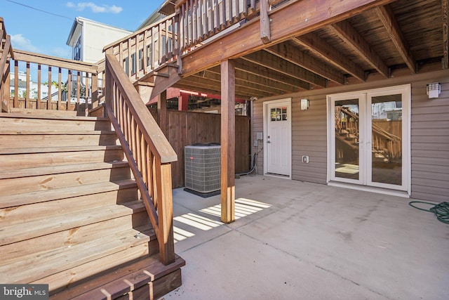 view of patio featuring a deck and central air condition unit