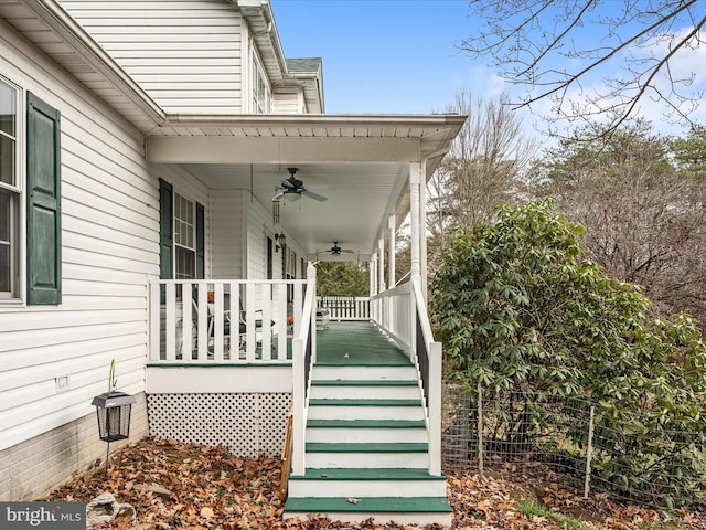 doorway to property with ceiling fan and covered porch