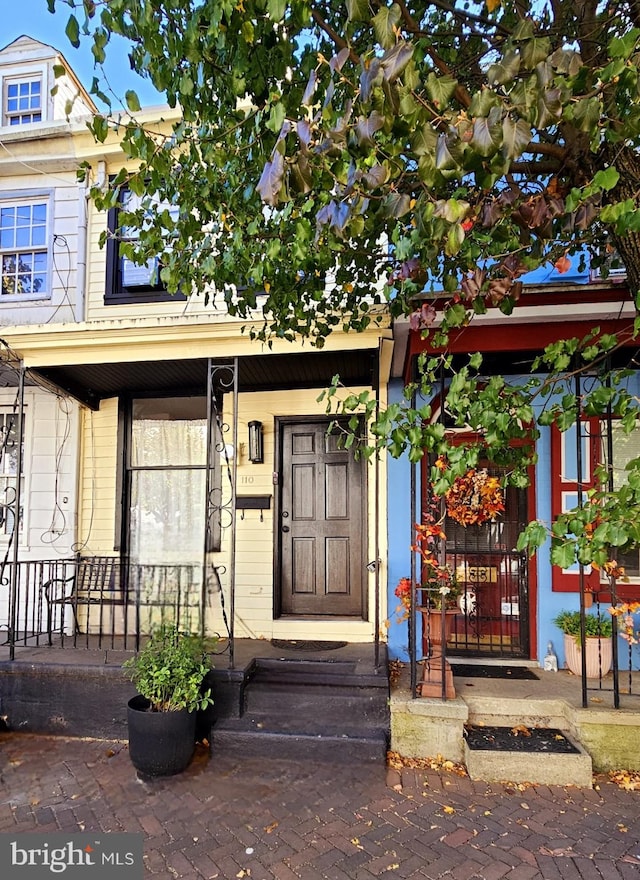 property entrance with a porch