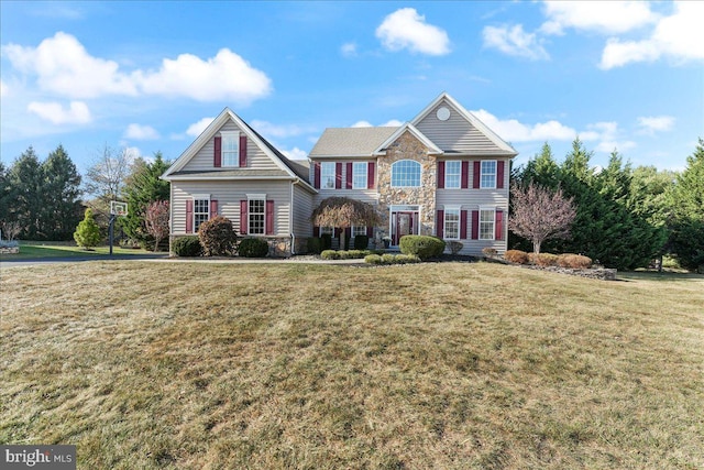 view of front of house featuring a front lawn