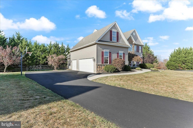 view of home's exterior featuring a garage and a yard