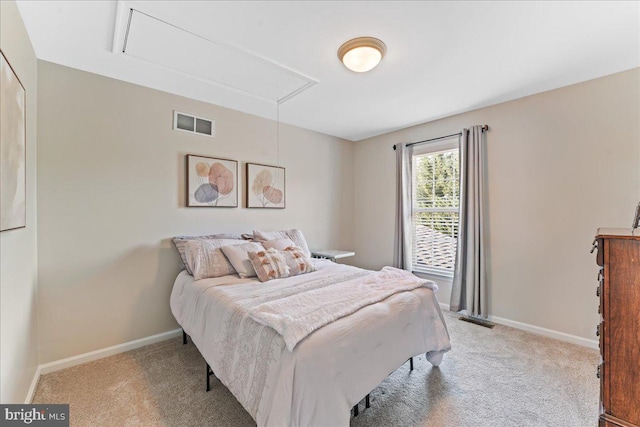 bedroom with light carpet