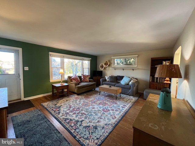 living room featuring dark hardwood / wood-style floors