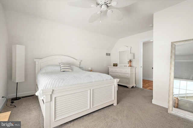 carpeted bedroom featuring ceiling fan and lofted ceiling