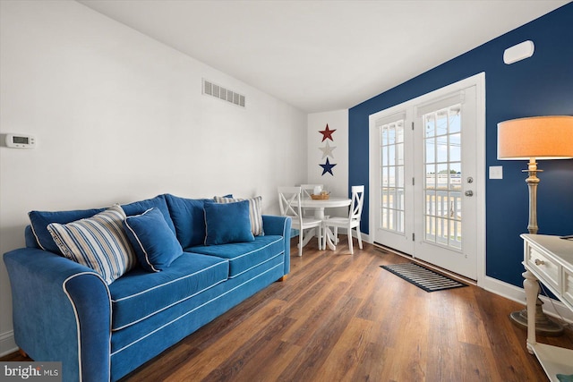 living room featuring dark hardwood / wood-style floors