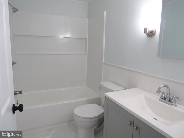 full bathroom featuring shower / bathing tub combination, vanity, and toilet