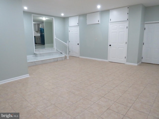 basement featuring black fridge