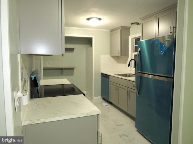 kitchen featuring stainless steel dishwasher, sink, black range, gray cabinets, and fridge